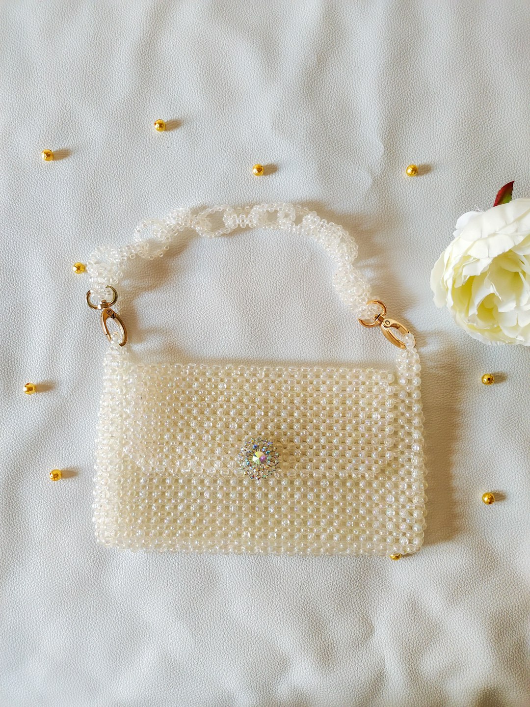 Elegant handmade-style white handbag for beaded bag inspiration